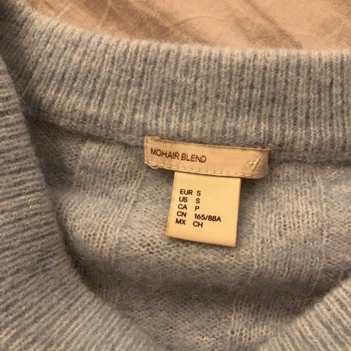 Ljusblå mohairtröja från H&M  - 92