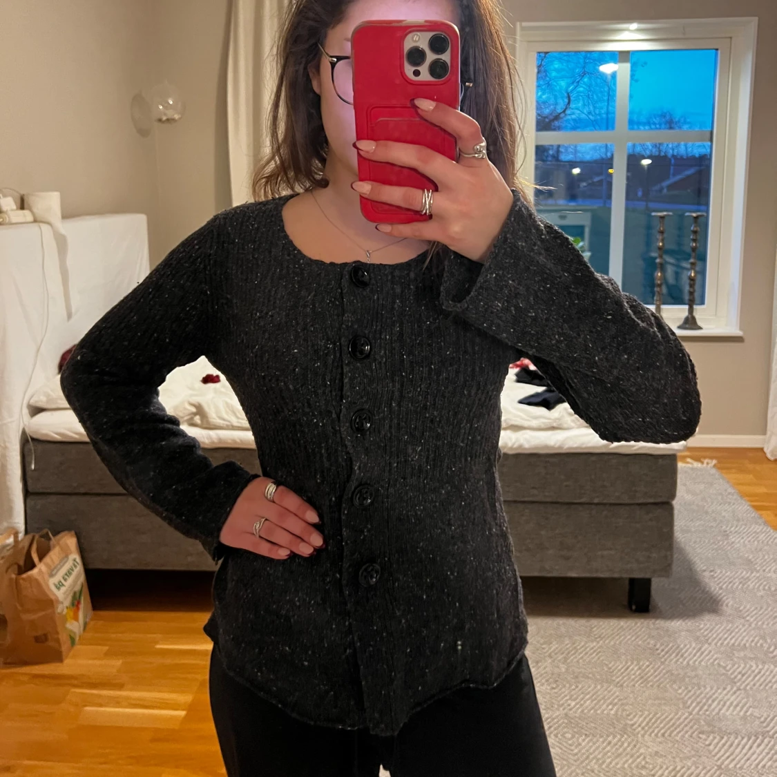 Ull tröja med knappar