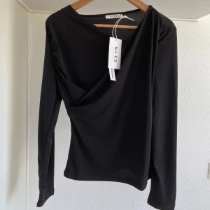 Topp M - Storlek M oanvänd pris 170kr