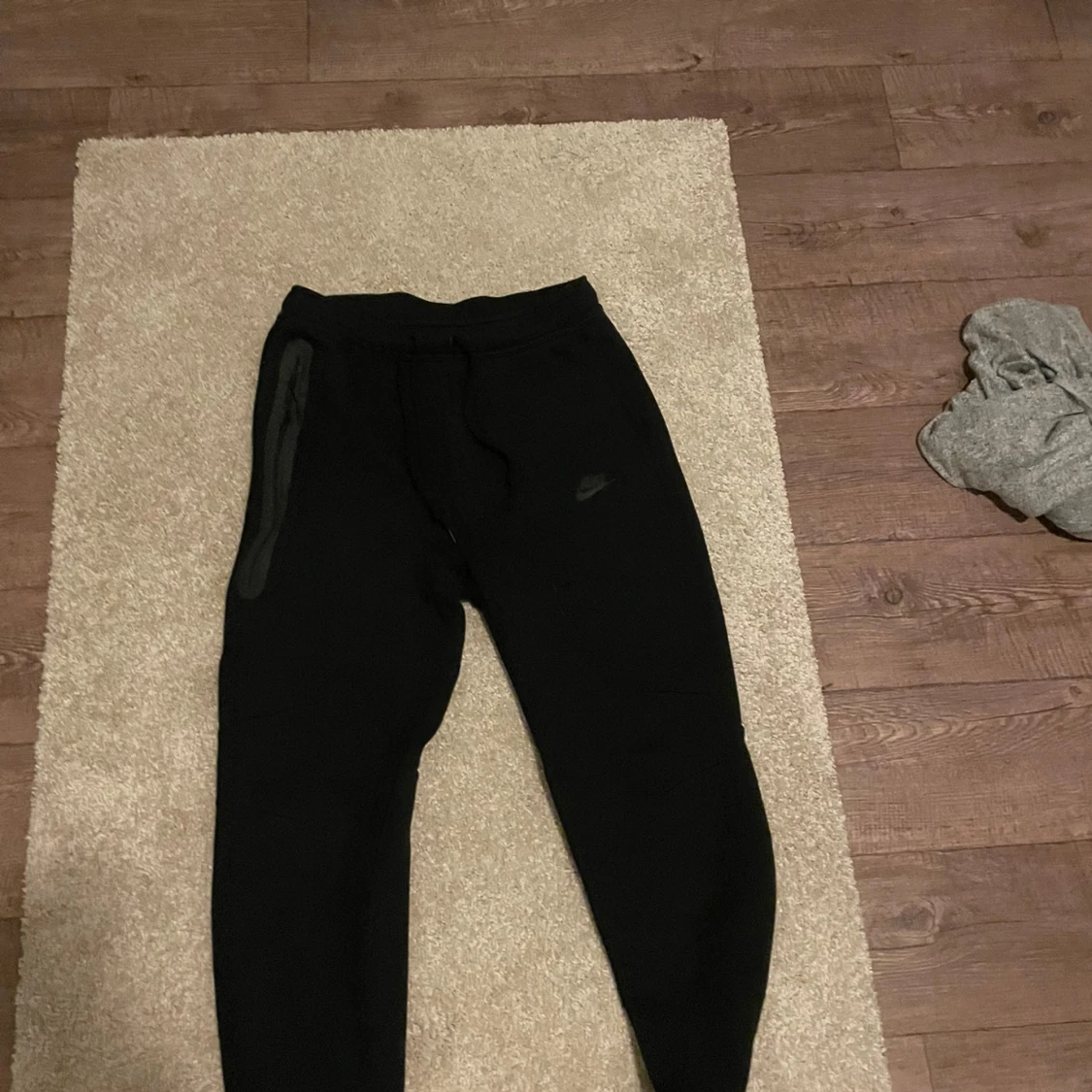 Nike tech byxor svart