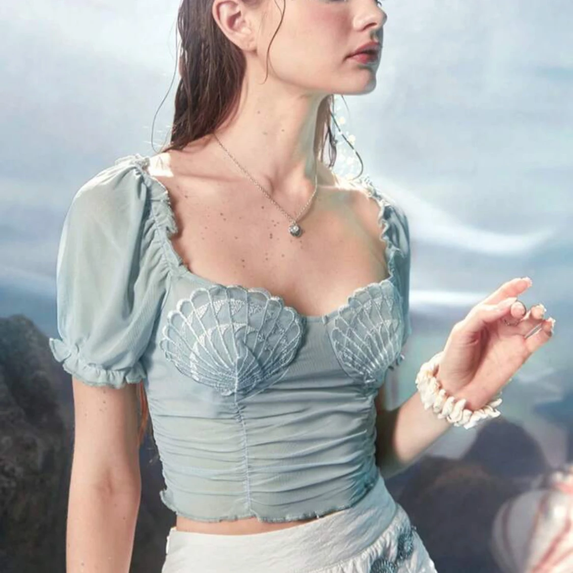 Blågrön topp med snäckdetaljer från Romwe - 3