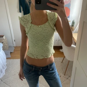 Grön spetstopp - Så fin grön spetstopp!! Jättefina detaljer och rosetter💛💛