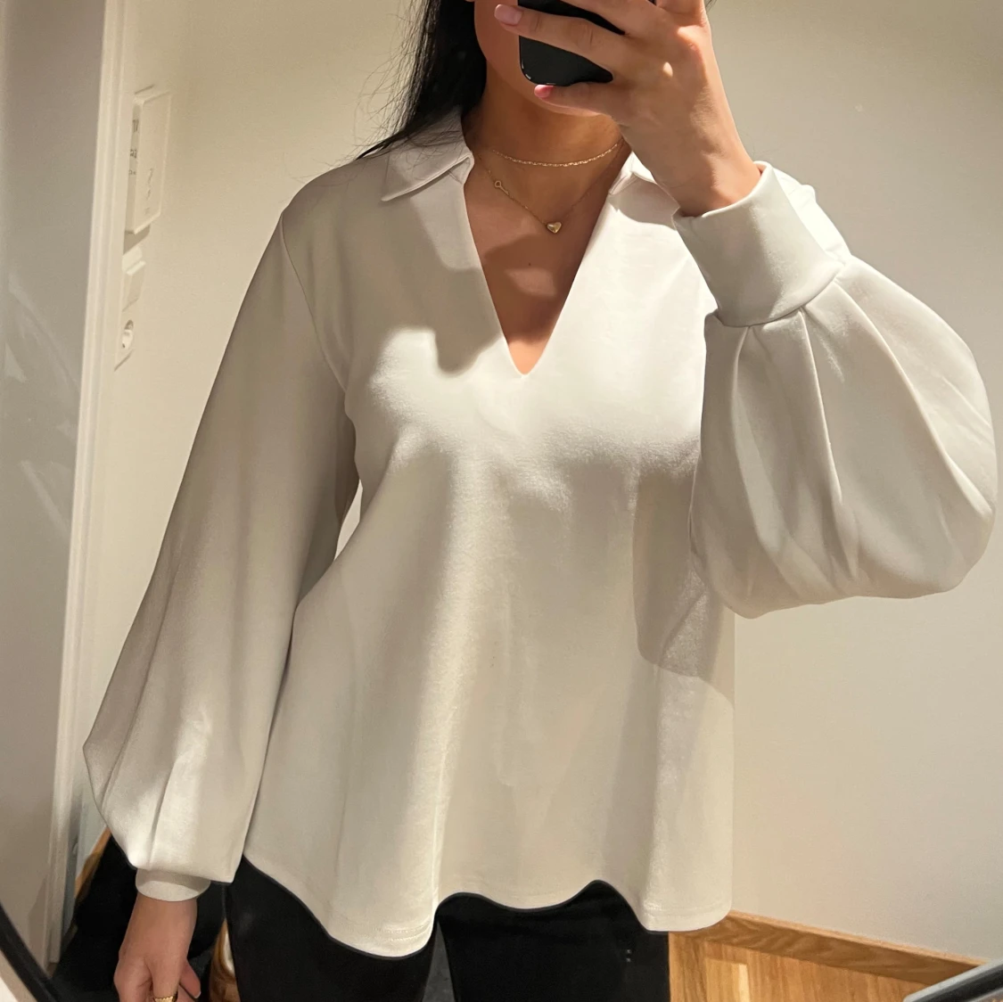 Vit blus från Stockh LM