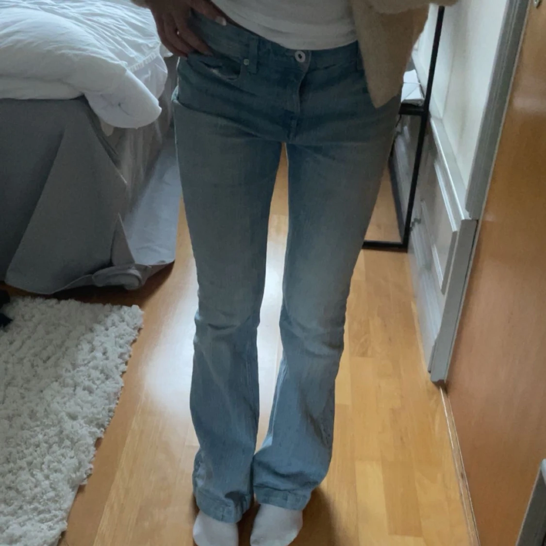 Ljusblå bootcut jeans