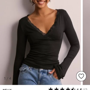 Nelly romance wrap top - Använd en gång i perfekt skick. Slutsåld på hemsidan.