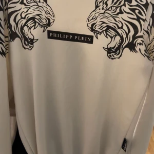 Philipe pleik  - Storlek m men passar s , materialet är stretchig 
