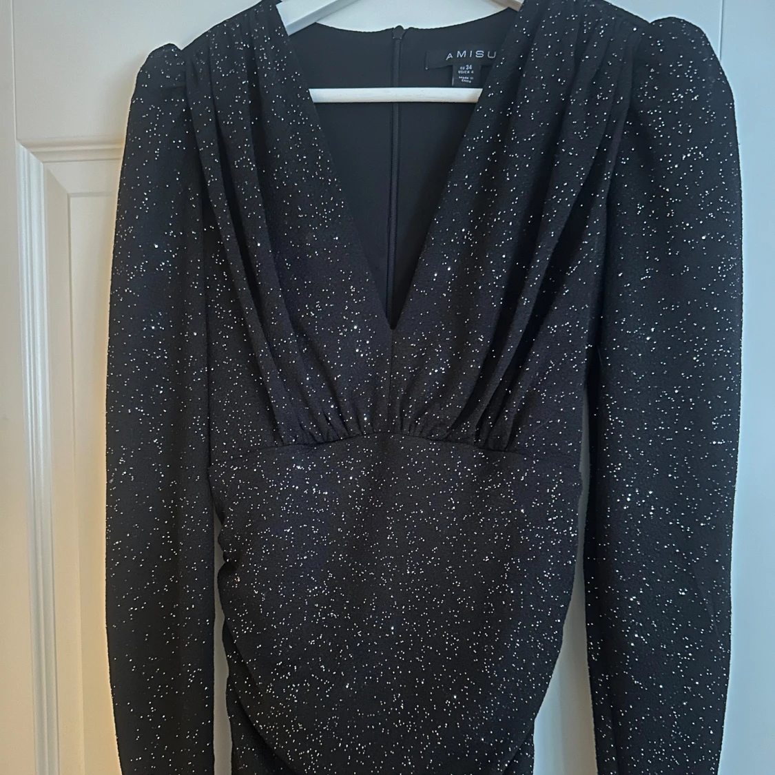 Svart-glittrig klänning