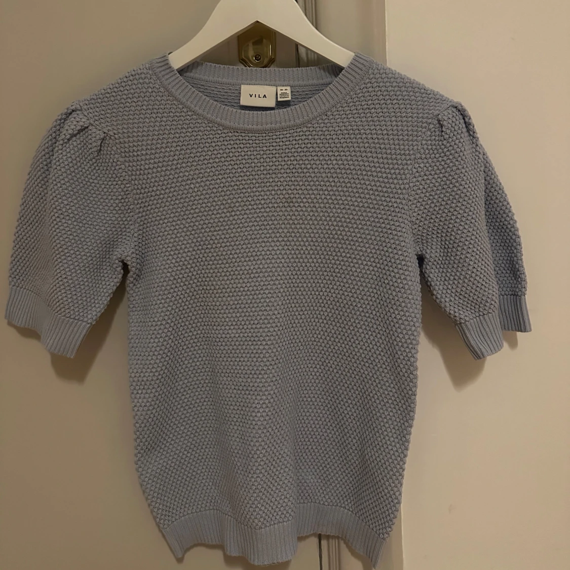 Ljusblå stickad tröja från Vila