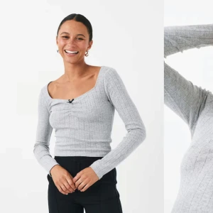 Ginatricot rosett topp - En långarmad tröja med rosett ifrån Ginatricot i strl S. 