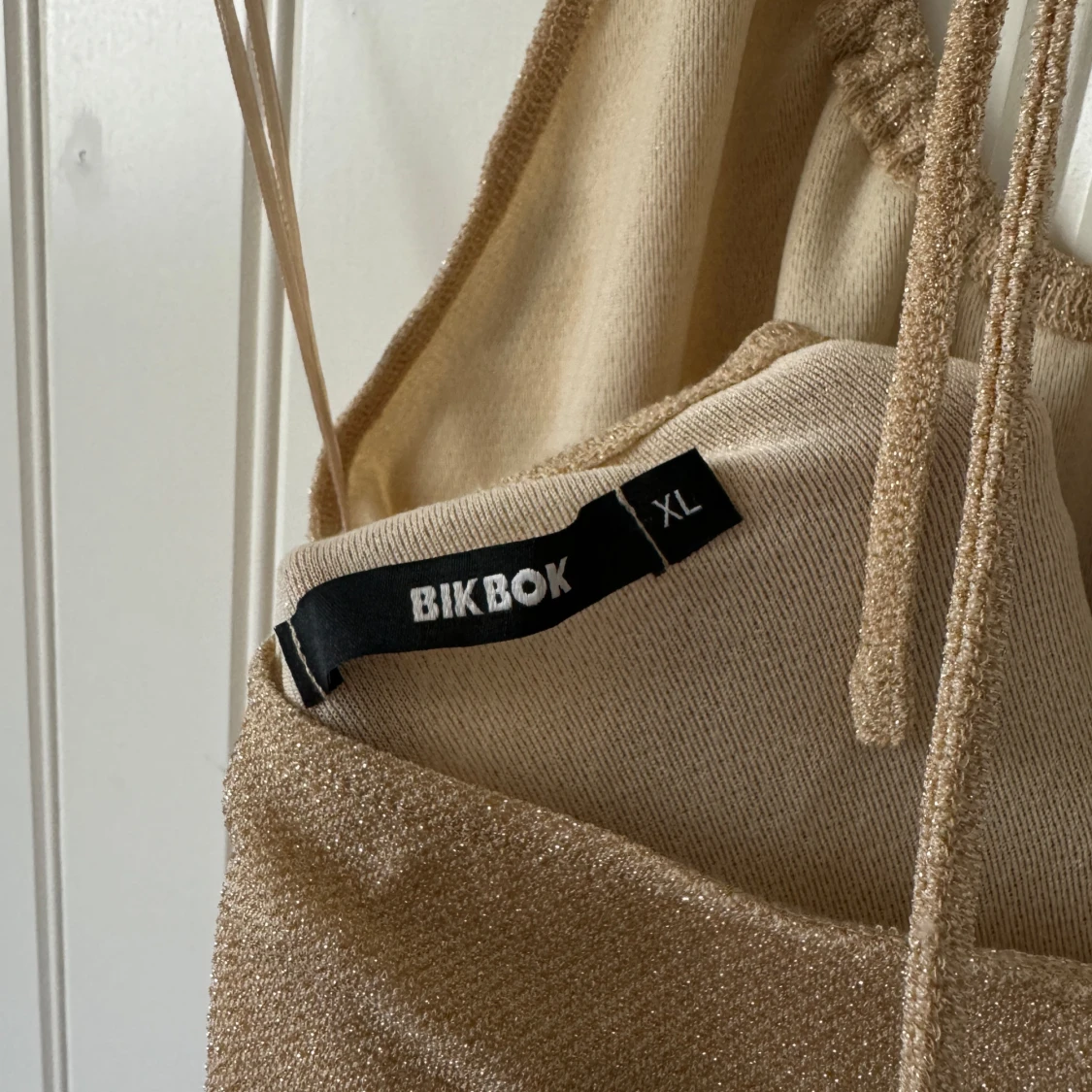 Glittrig festtopp/linne - 91