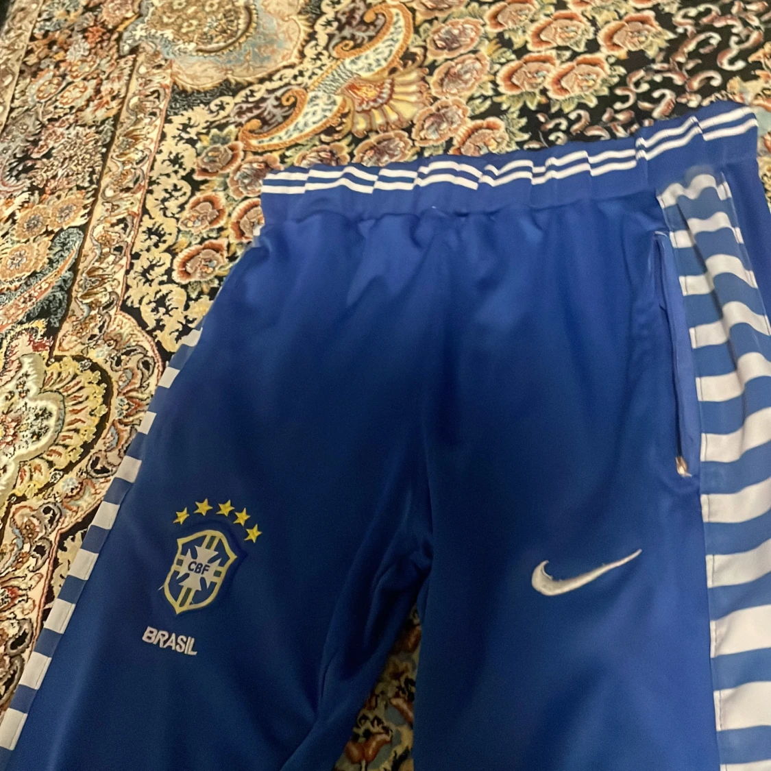 Blå Nike träningsbyxor med Brasilien-logga - 90