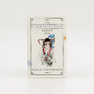 A Fabulous Mini Edition of the Linestrider Tarot Spun with soft strokes of vibrant color and intricate detail, Linestrider Tarot Mini features gentle yet evocative images that dance on the edge between magic and logic. With grace and innovation, Siolo Thompson's captivating art will enhance your readings in powerful and profound ways. Linestriding is about walking in two worlds—one foot in each to discover guidance. Drawing inspiration from the edge while still moving forward on the Fool's journey, this Rider-Waite-Smith-based deck helps uncover the answers you seek about health, love, career, and much more. This is a mini edition of the Linestrider Tarot (9780738748290).