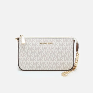 Michael Kors väska - Helt oöppnad ny väska och fortfarande inplastad. Jättefin beige vanilj färg med guldig kedja. Ordninarie pris 1695kr