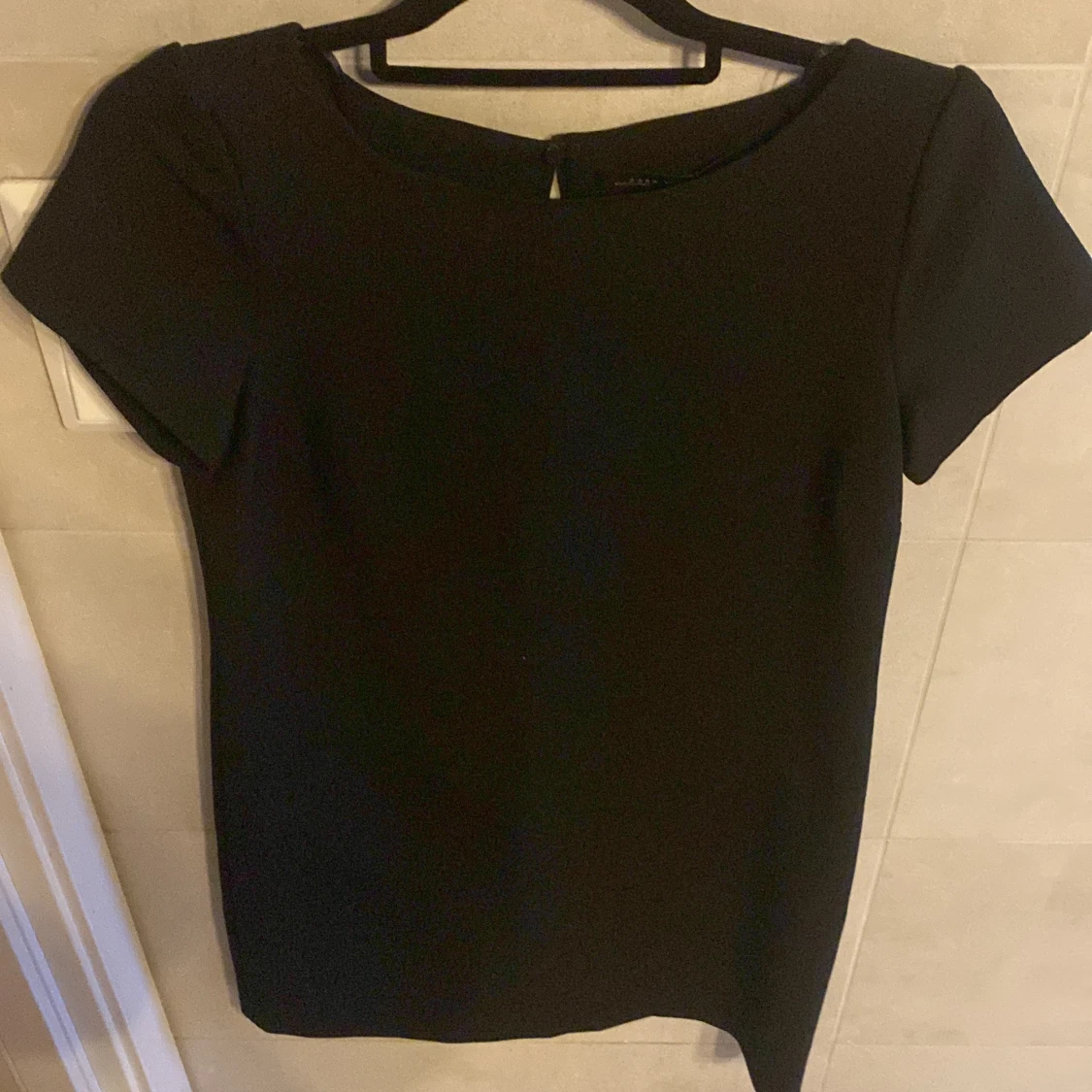 En svart klänning  - 90