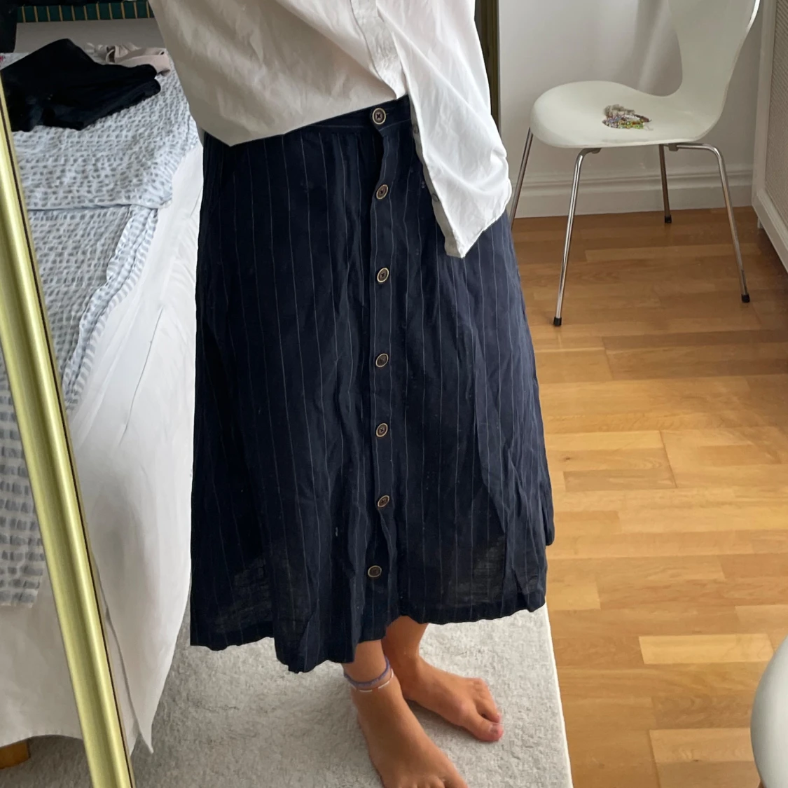 Mörkblå kjol med knappar - 91