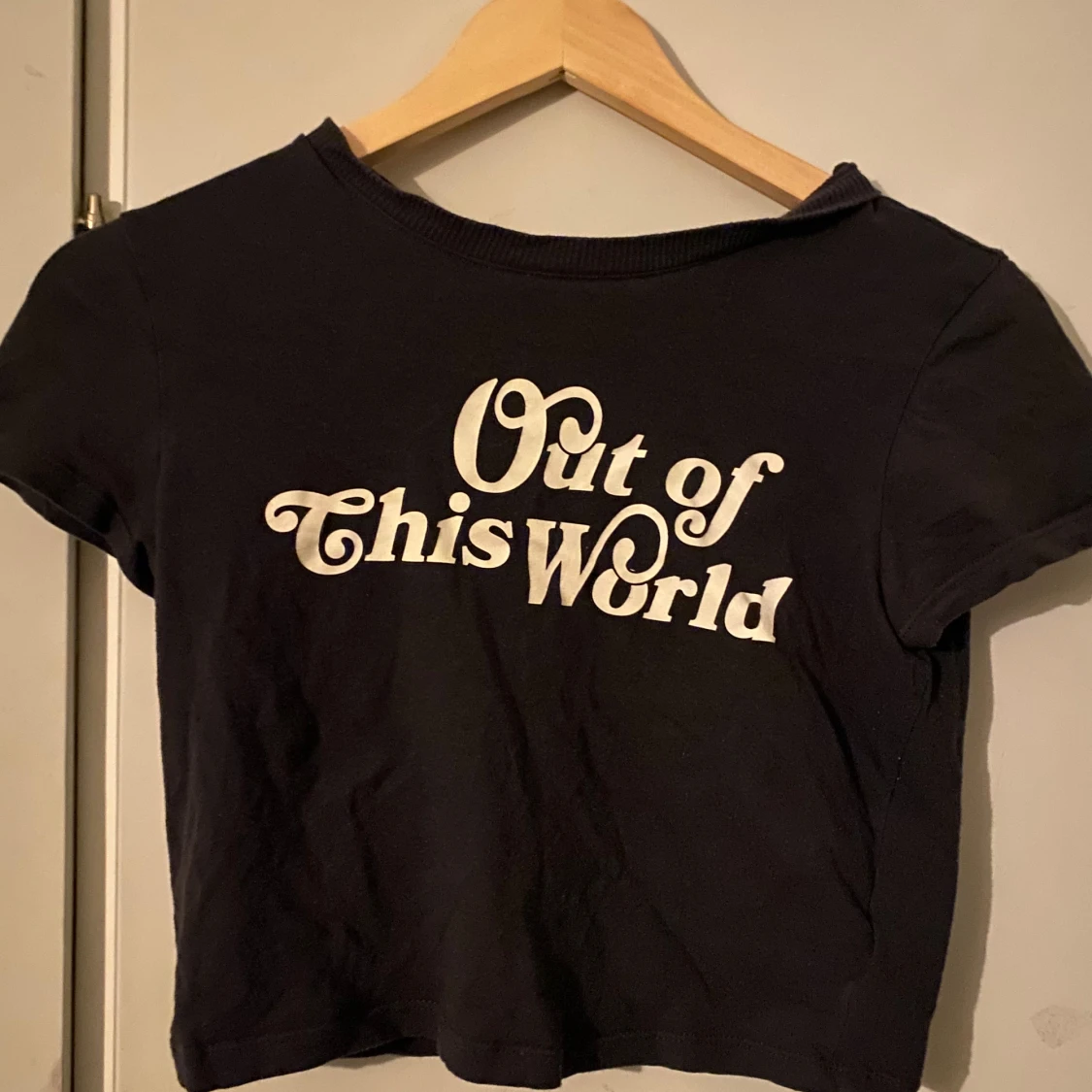 ”Out of this world” baby tee