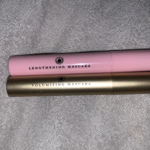 Mascara duo i rosa och guld. Använd 1 gång  - Säljer två mascaror: en rosa för längd och en guldig för volym. Perfekt för att skapa dramatiska fransar med både längd och fyllighet. Båda har en klassisk borste för enkel applicering.