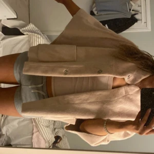 Rosa poncho cape  - Från Jackie 