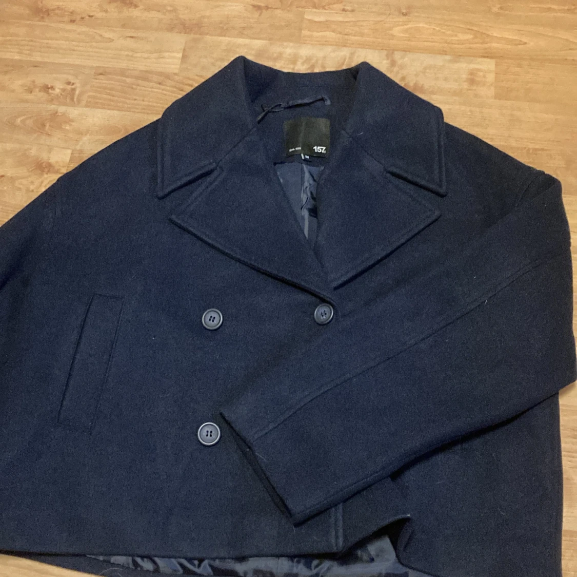 Mörkblå skepparkavaj