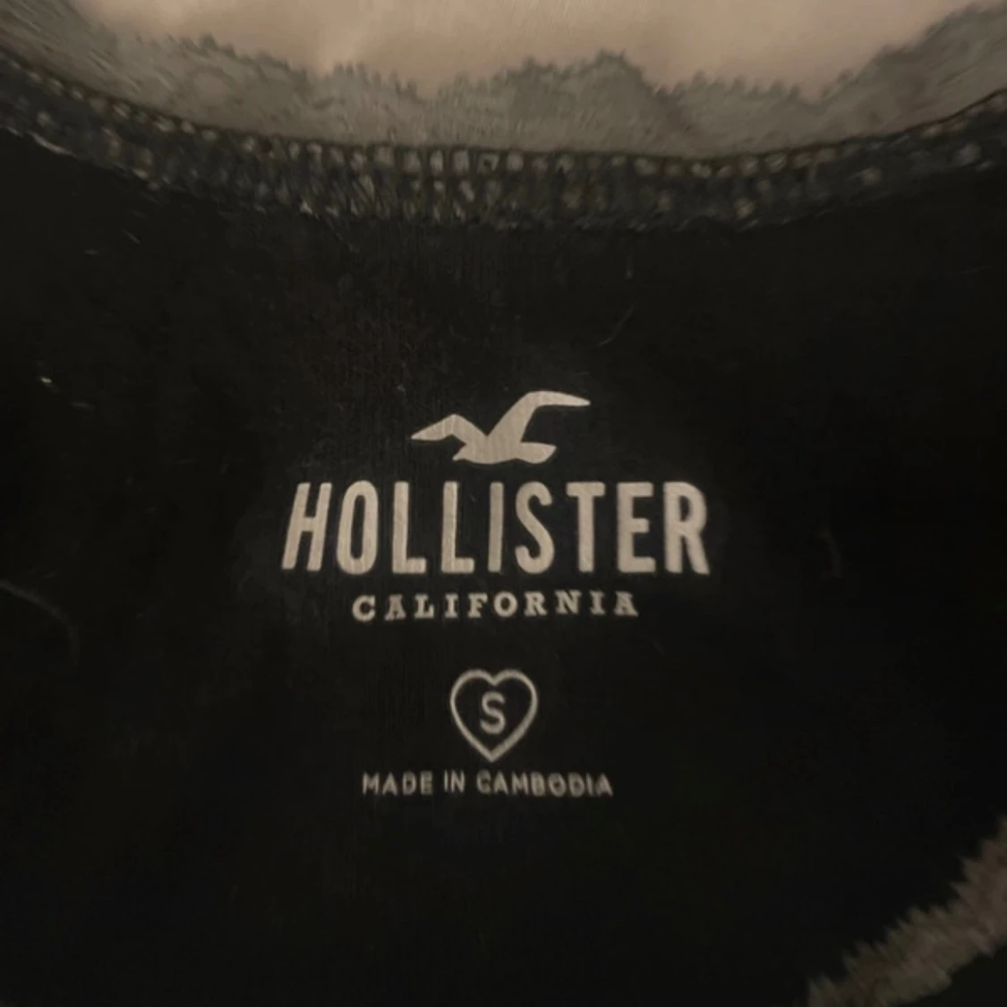 Svart linnetopp från Hollister - 90