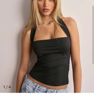 Topp - Topp från nelly. Lappen kvar om ja minns rätt. Aldrig använd