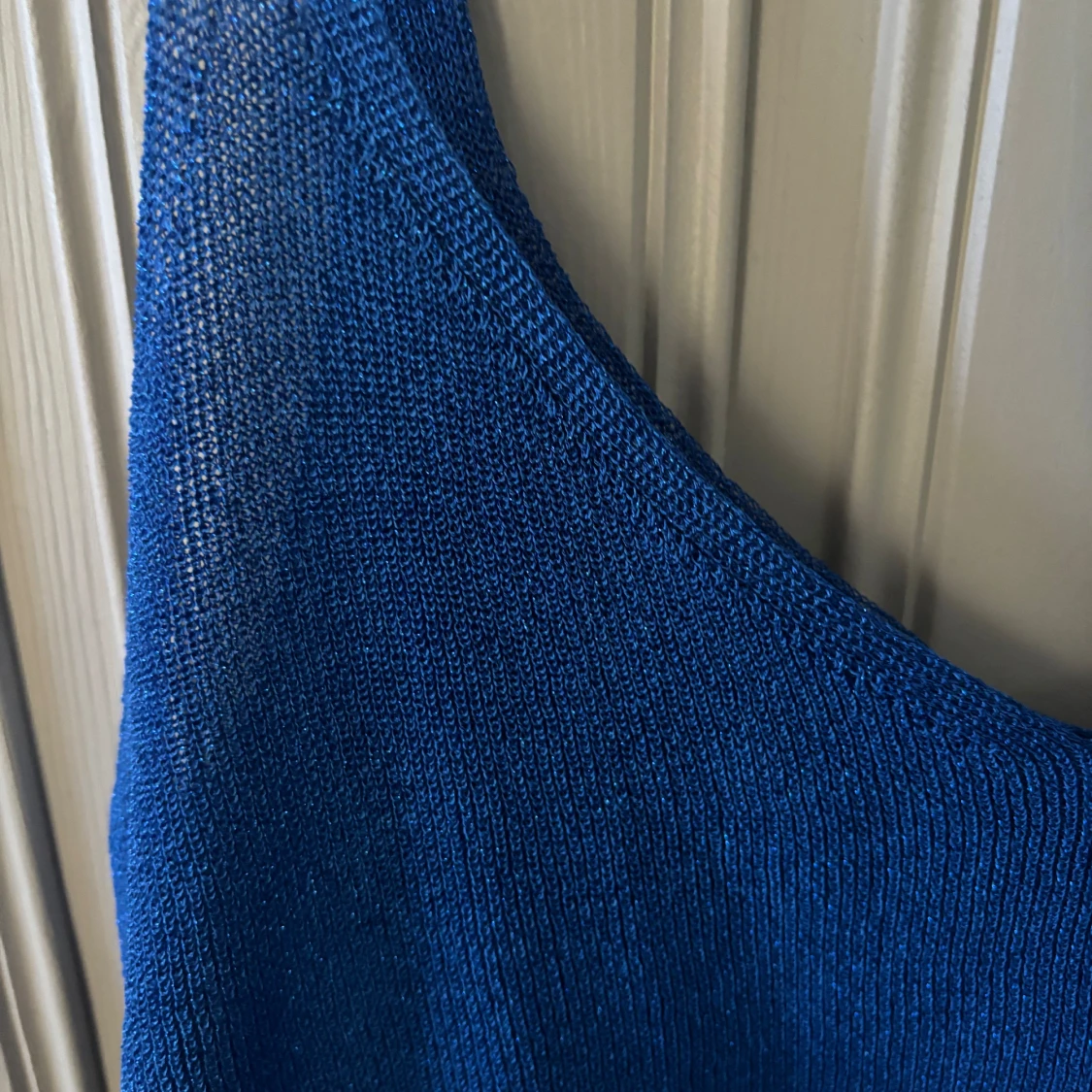 Glittrig blått linne - 90