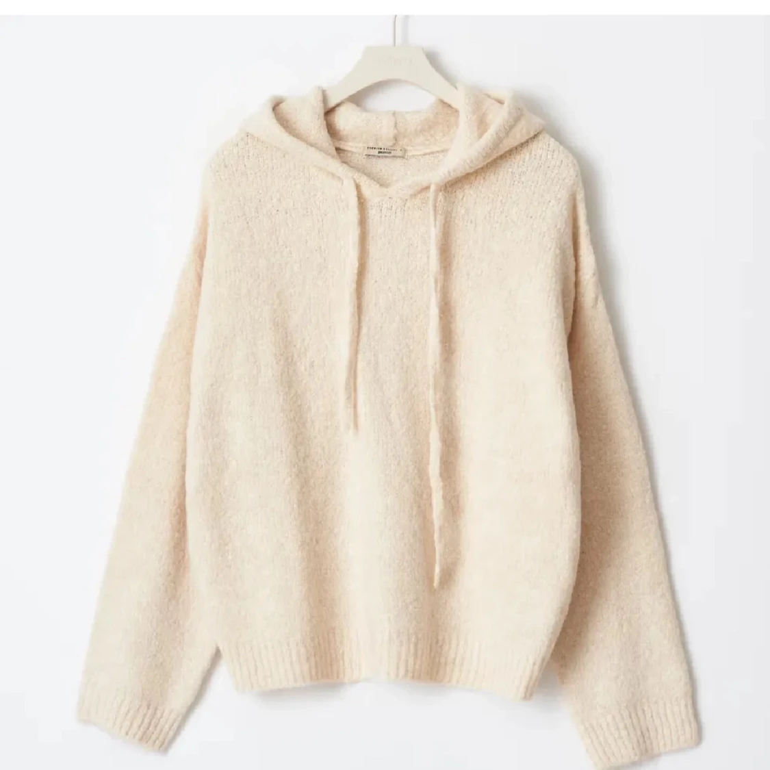 Stickad hoodie