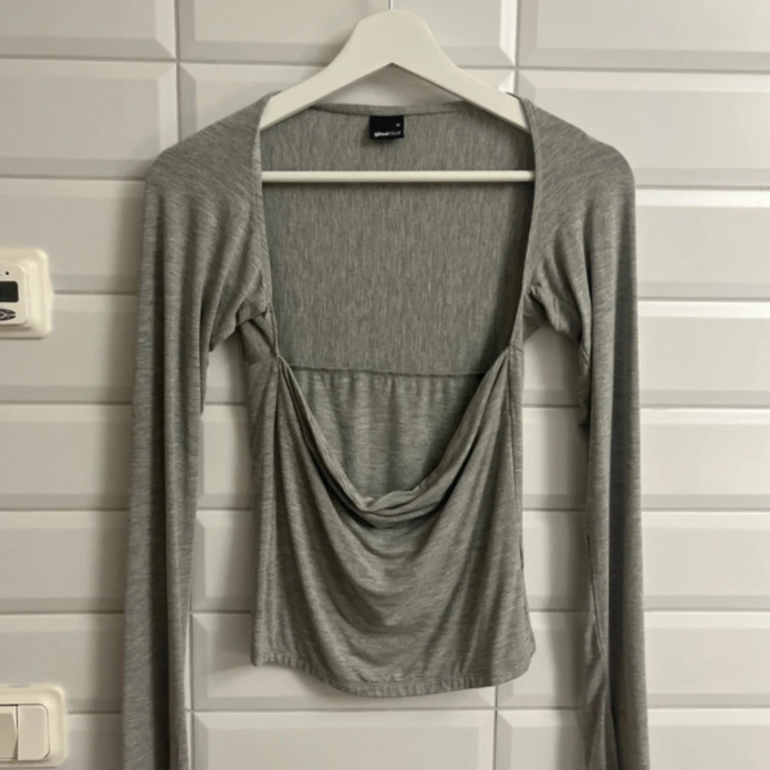 Grå långärmad topp från Gina Tricot storlek:M