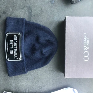 John hatter mössa - John hatter mössa. Onesize. Ny skick