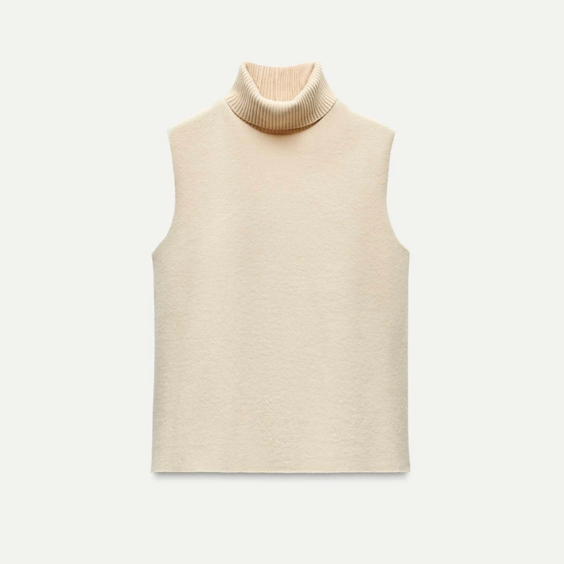 Beige ärmlös polotröja