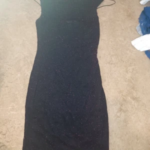 Klänning  - Bra har glitter i sig 