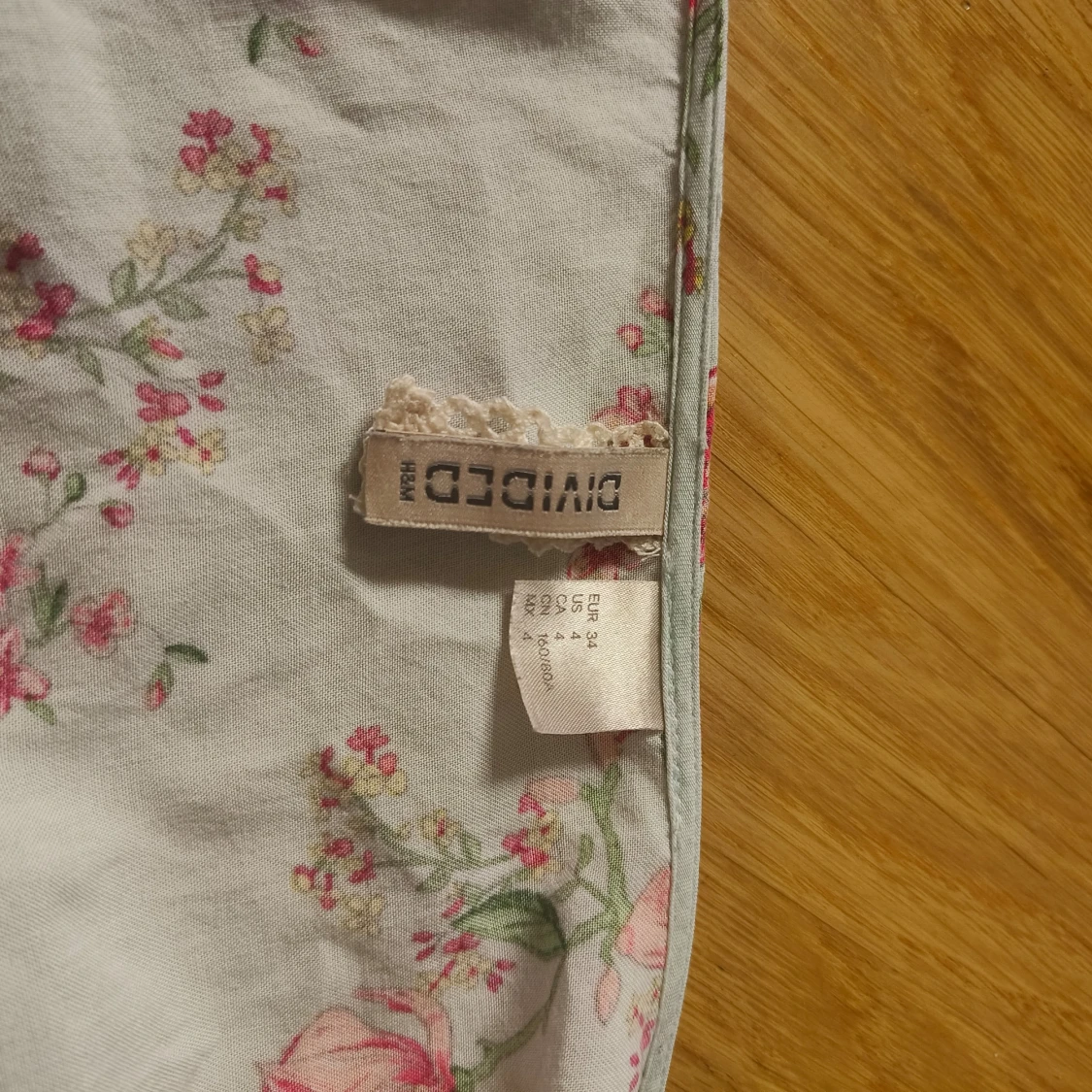 Blå romper med blomtryck - 91