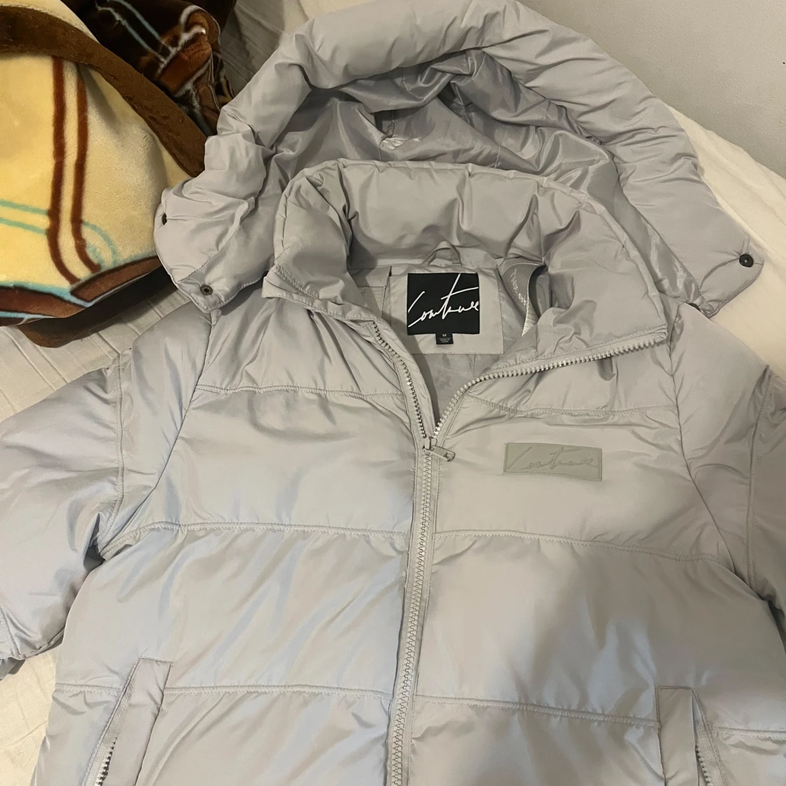 Grå pufferjacka från Couture