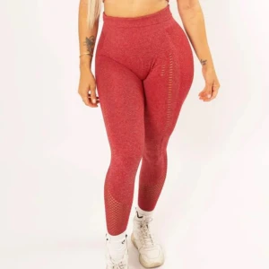 Xshapes Embrace tights röd - Snygga röda leggings med hög midja och meshdetaljer från Xshapes. Strl S (passar mig som har XS). Nyskick