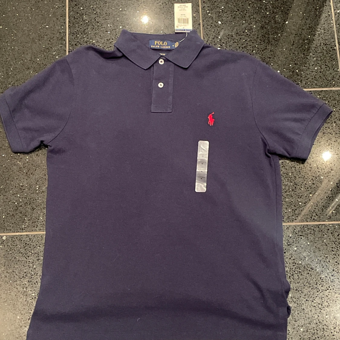 Mörkblå pikétröja från Ralph Lauren