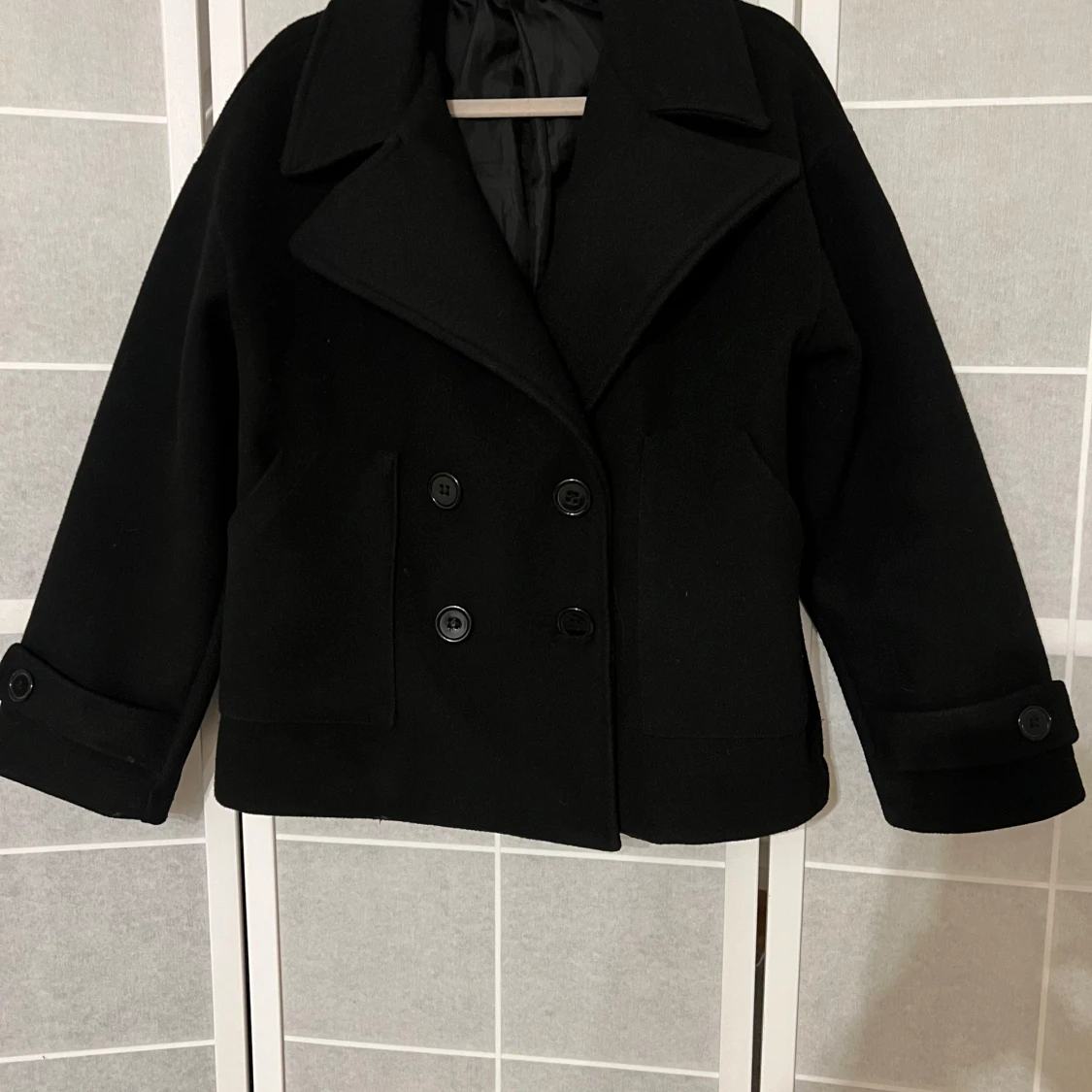 Svart kappa från design by si 