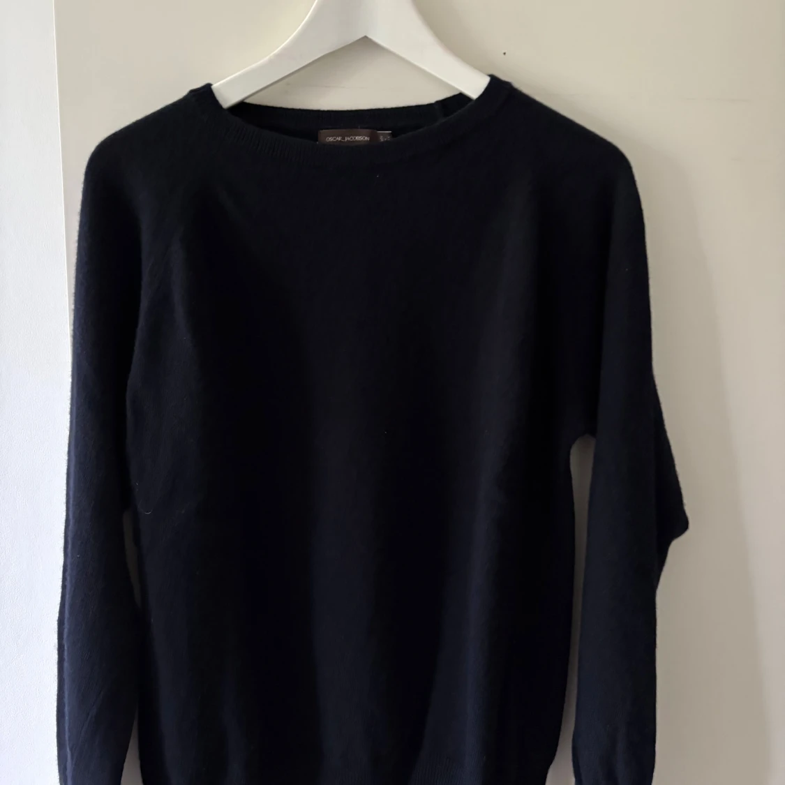 Blå ulltröja från Oscar Jacobson