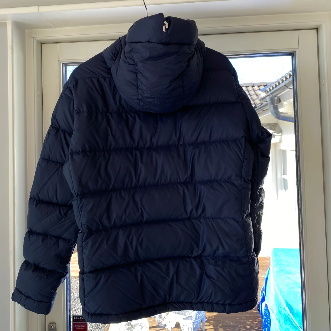 Mörkblå dunjacka från Peak Performance - 1