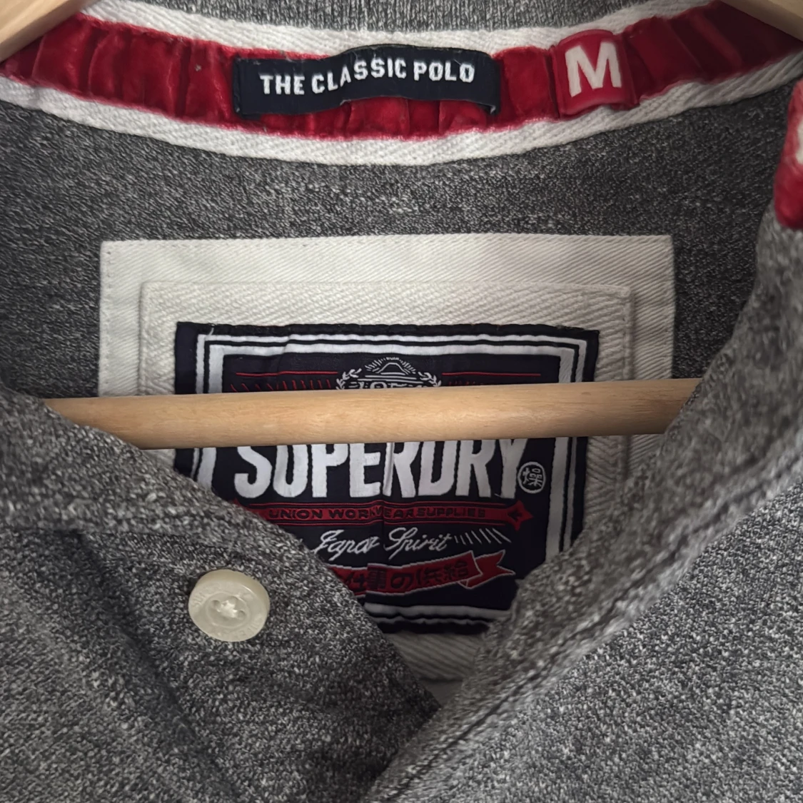 Grå pikétröja från Superdry Medium - 1