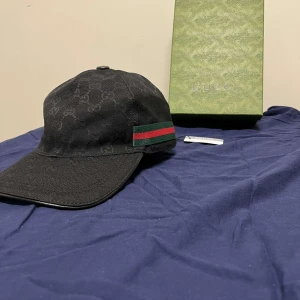 GG Keps - Stilren svart GG keps. Allt i bilderna ingår