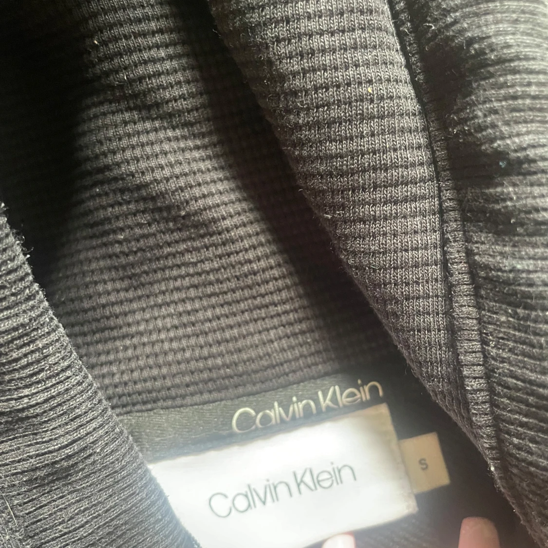 Svart hoodie från Calvin Klein - 1