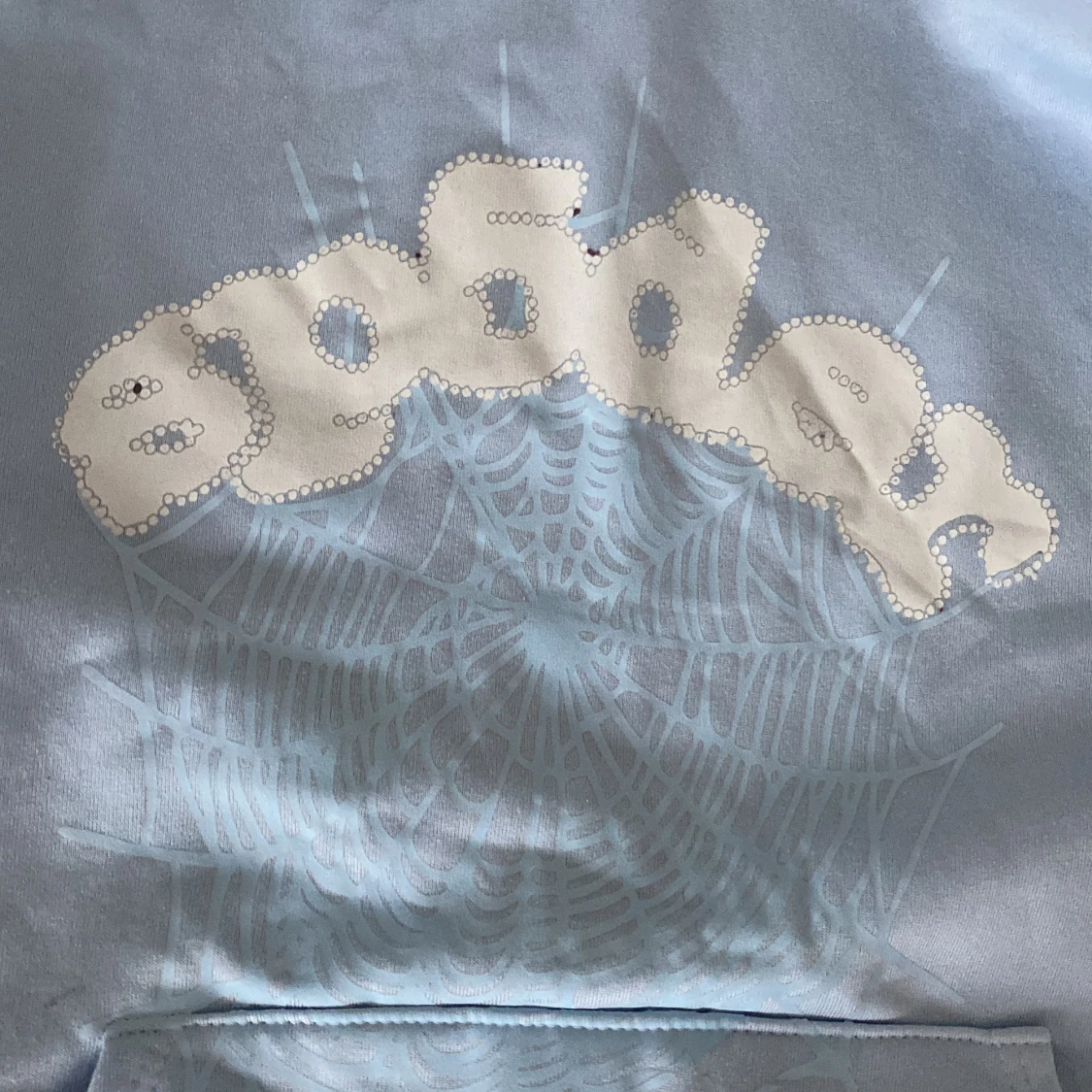 Ljusblå hoodie med tryck och huva - 1