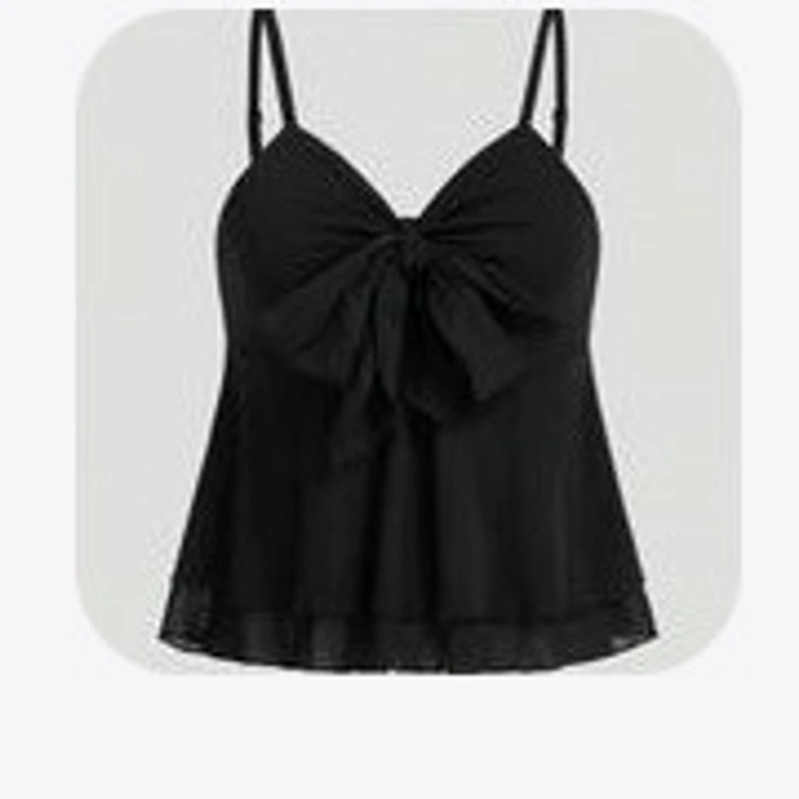 Svart linnetopp med rosett