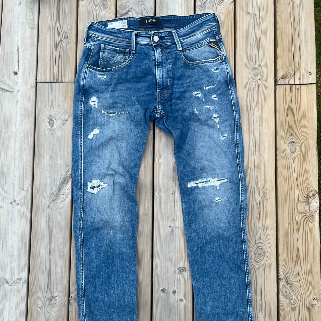 Blå Replay Anbass med slitningar