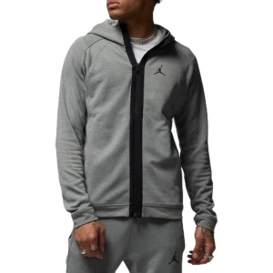 Grå hoodiejacka från Jordan - Snygg grå hoodiejacka från Jordan med svart dragkedja och klassisk logga på bröstet. Jackan har huva, långa ärmar och är tillverkad i mjukt bomullsmaterial. Perfekt för en sportig och avslappnad stil.