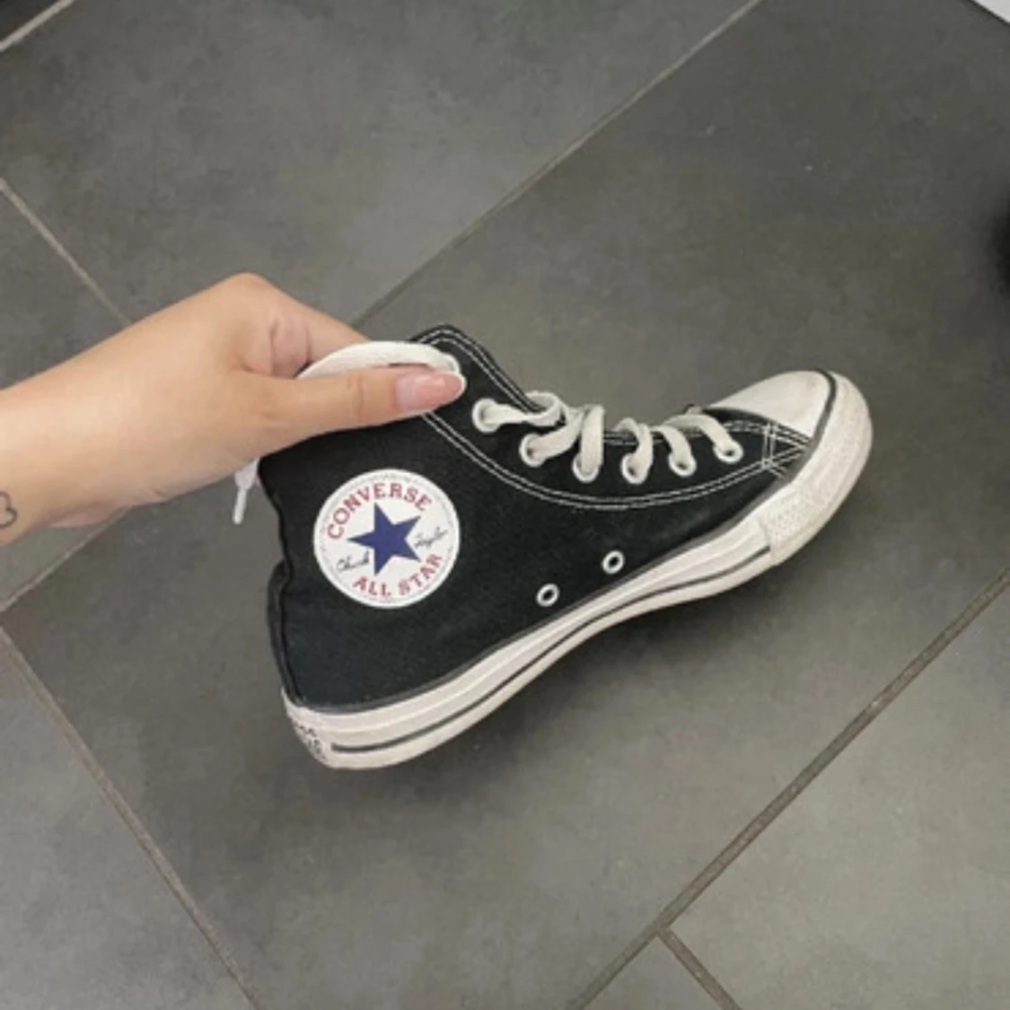 Svarta Converse All Star sneakers