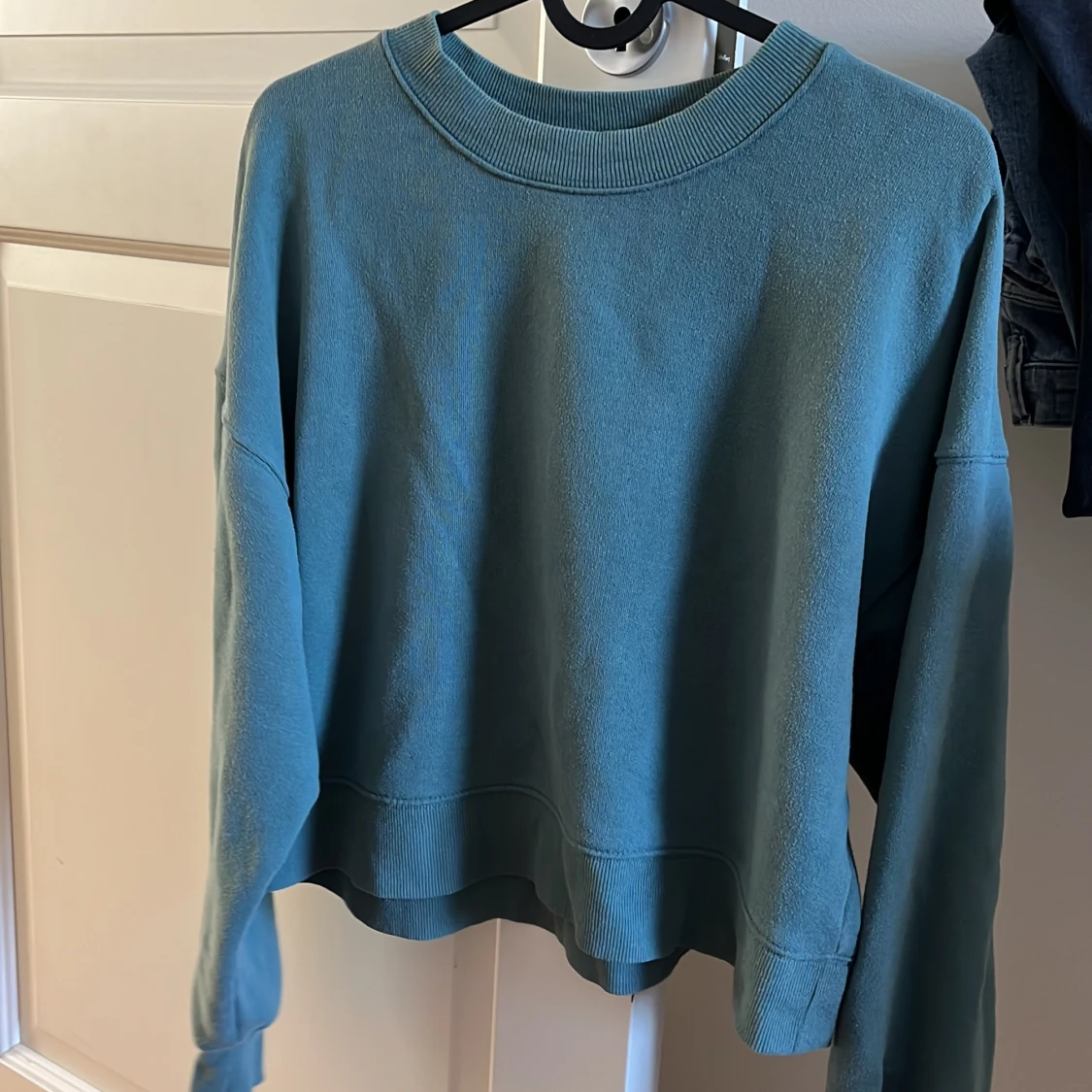Turkos tröja