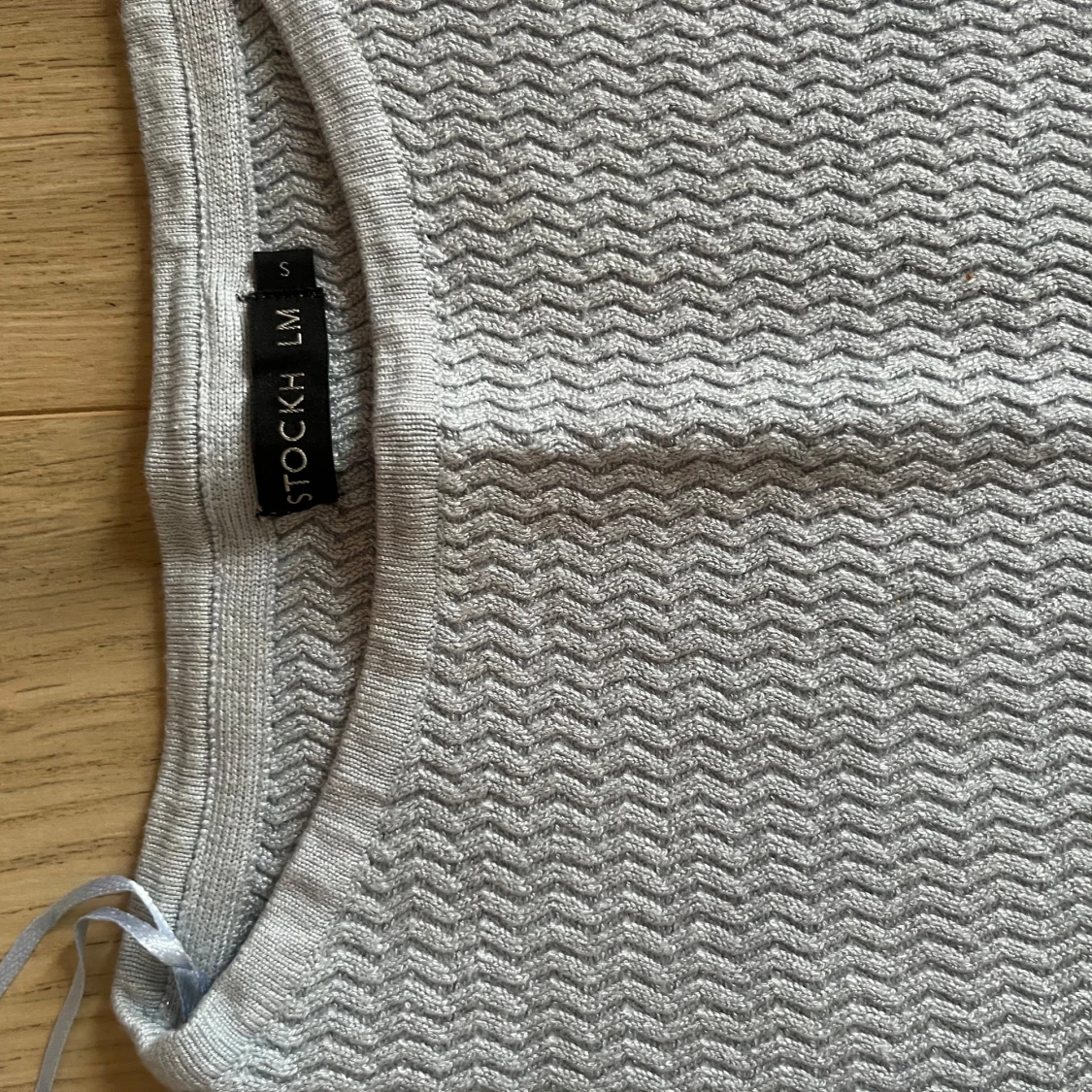Ljusblå tröja från Stockh LM strl S - 2