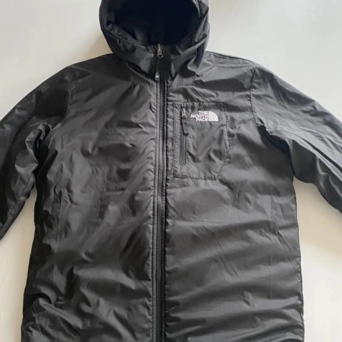 Svart quiltad pufferjacka The North Face