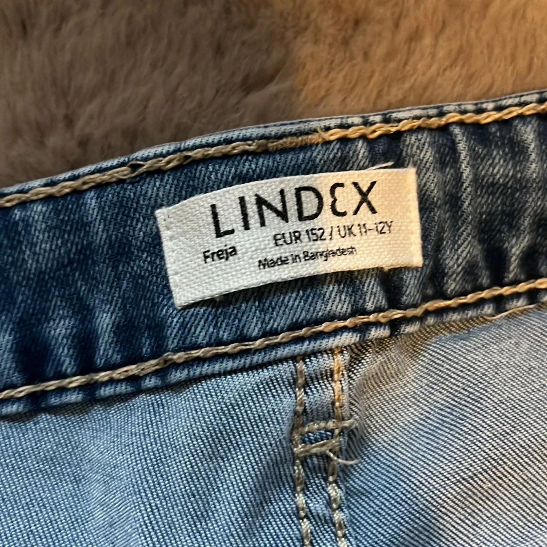 Blå bootcut jeans från Lindex - 2